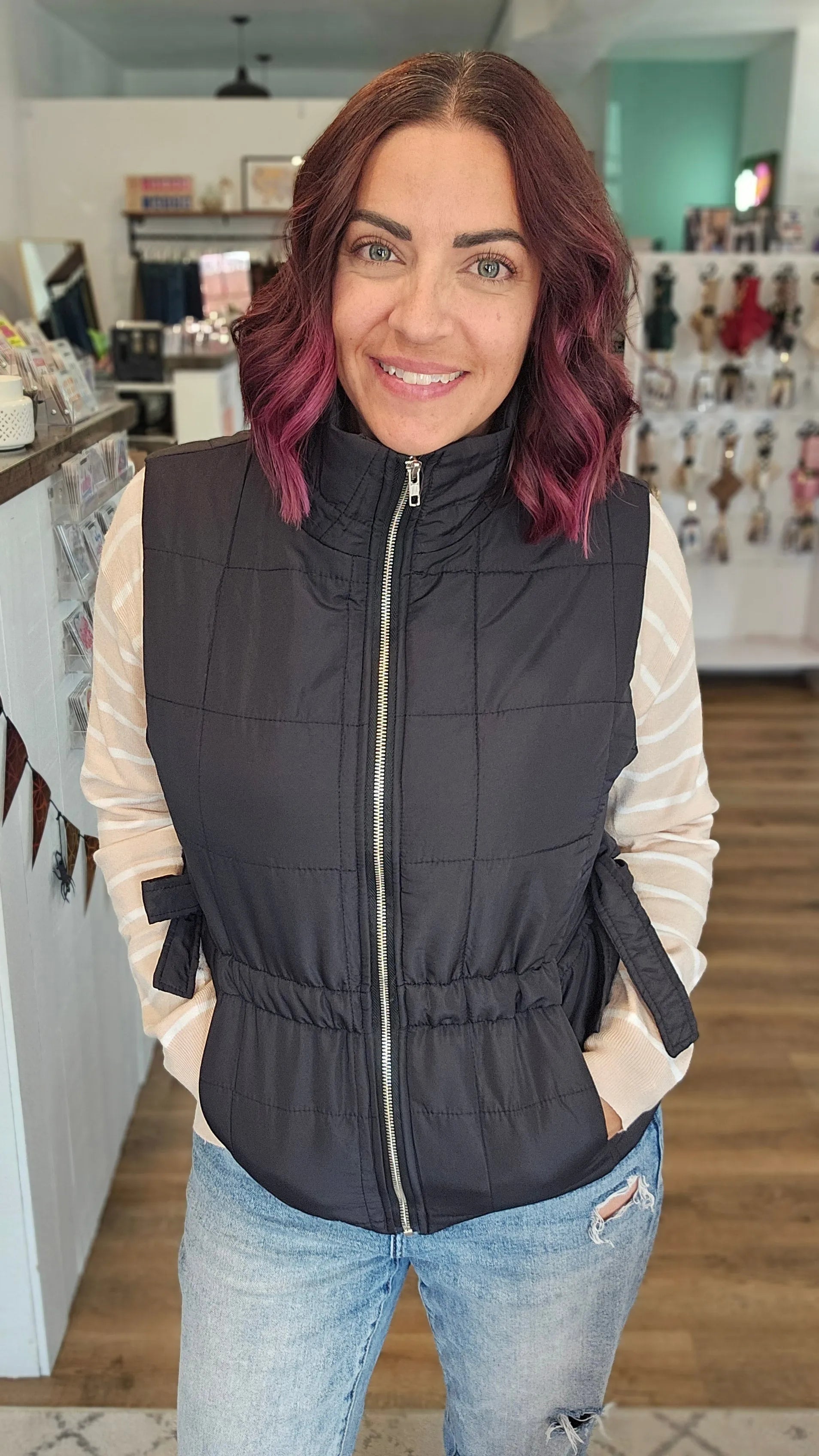 Shop Side Tie Quilted Puffer Vest - Black- at Ruby Joy Boutique, a Women's Clothing Store in Pickerington, Ohio
