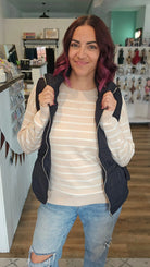 Shop Side Tie Quilted Puffer Vest - Black- at Ruby Joy Boutique, a Women's Clothing Store in Pickerington, Ohio