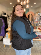 Shop Side Tie Quilted Puffer Vest - Black- at Ruby Joy Boutique, a Women's Clothing Store in Pickerington, Ohio