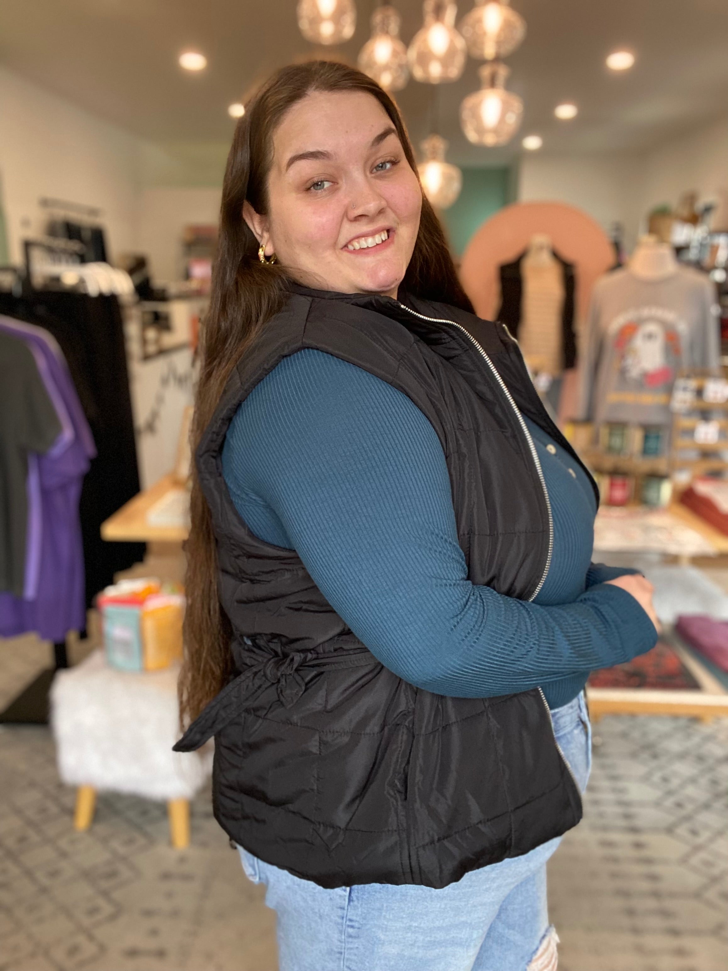 Shop Side Tie Quilted Puffer Vest - Black- at Ruby Joy Boutique, a Women's Clothing Store in Pickerington, Ohio