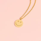 Shop Smile Face Disc Charm- at Ruby Joy Boutique, a Women's Clothing Store in Pickerington, Ohio