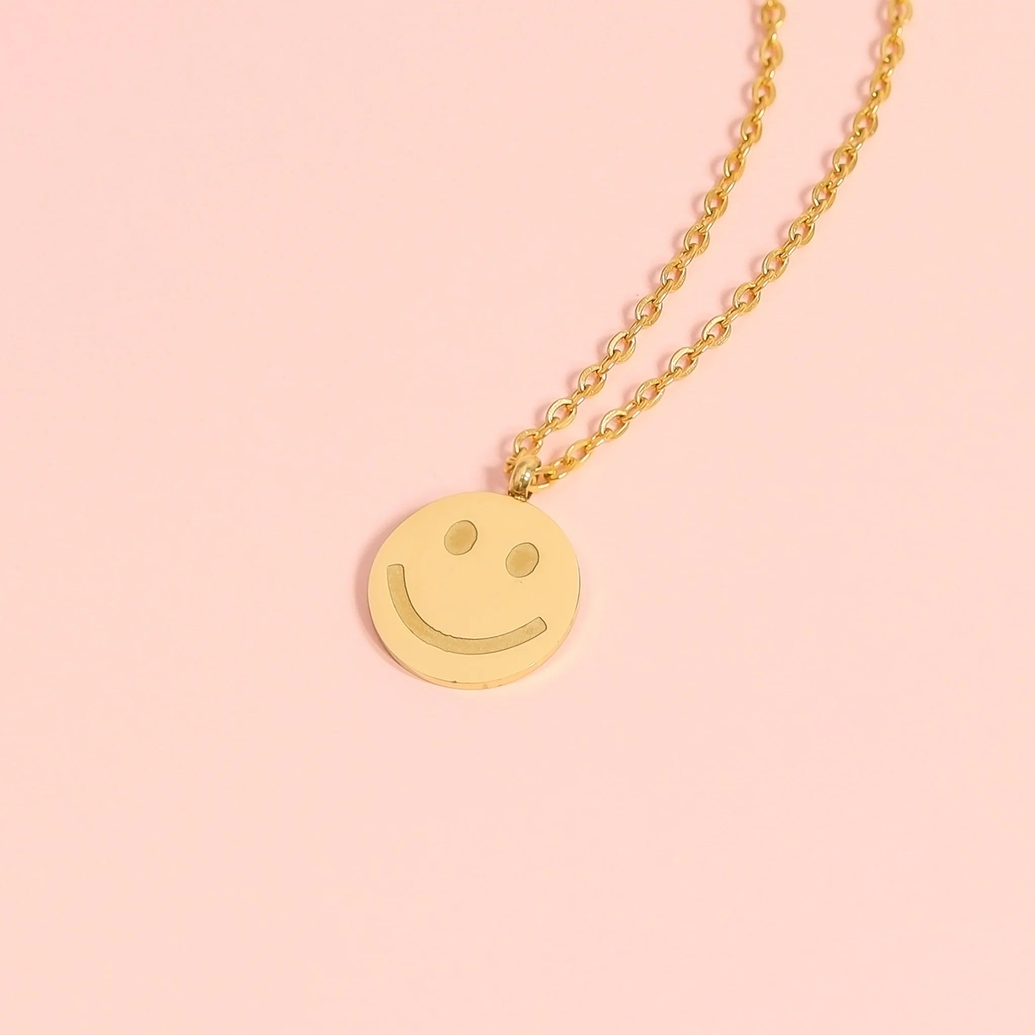 Shop Smile Face Disc Charm- at Ruby Joy Boutique, a Women's Clothing Store in Pickerington, Ohio