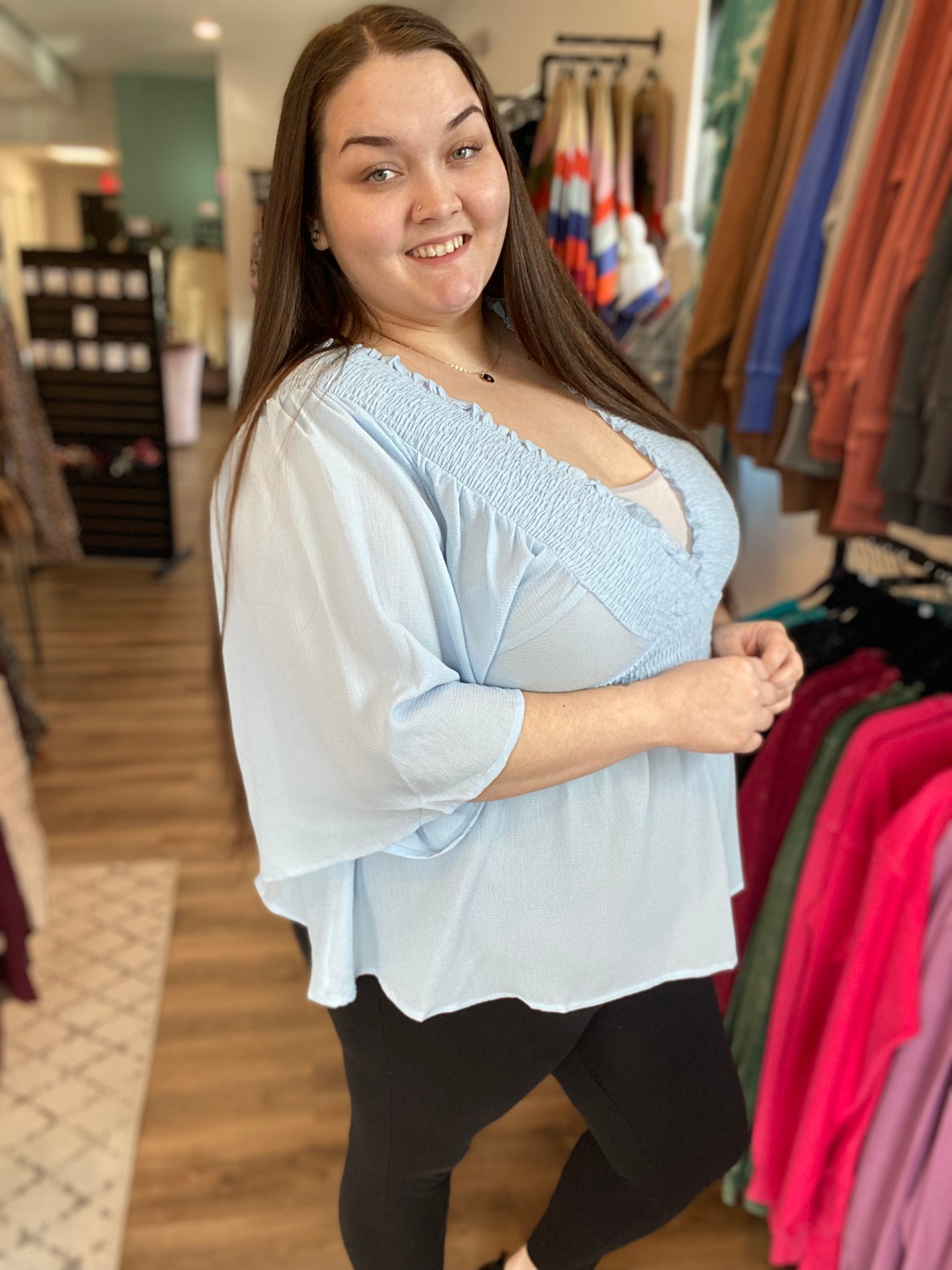 Shop Smocked Surplice Peplum Blouse - Baby Blue-Blouse at Ruby Joy Boutique, a Women's Clothing Store in Pickerington, Ohio