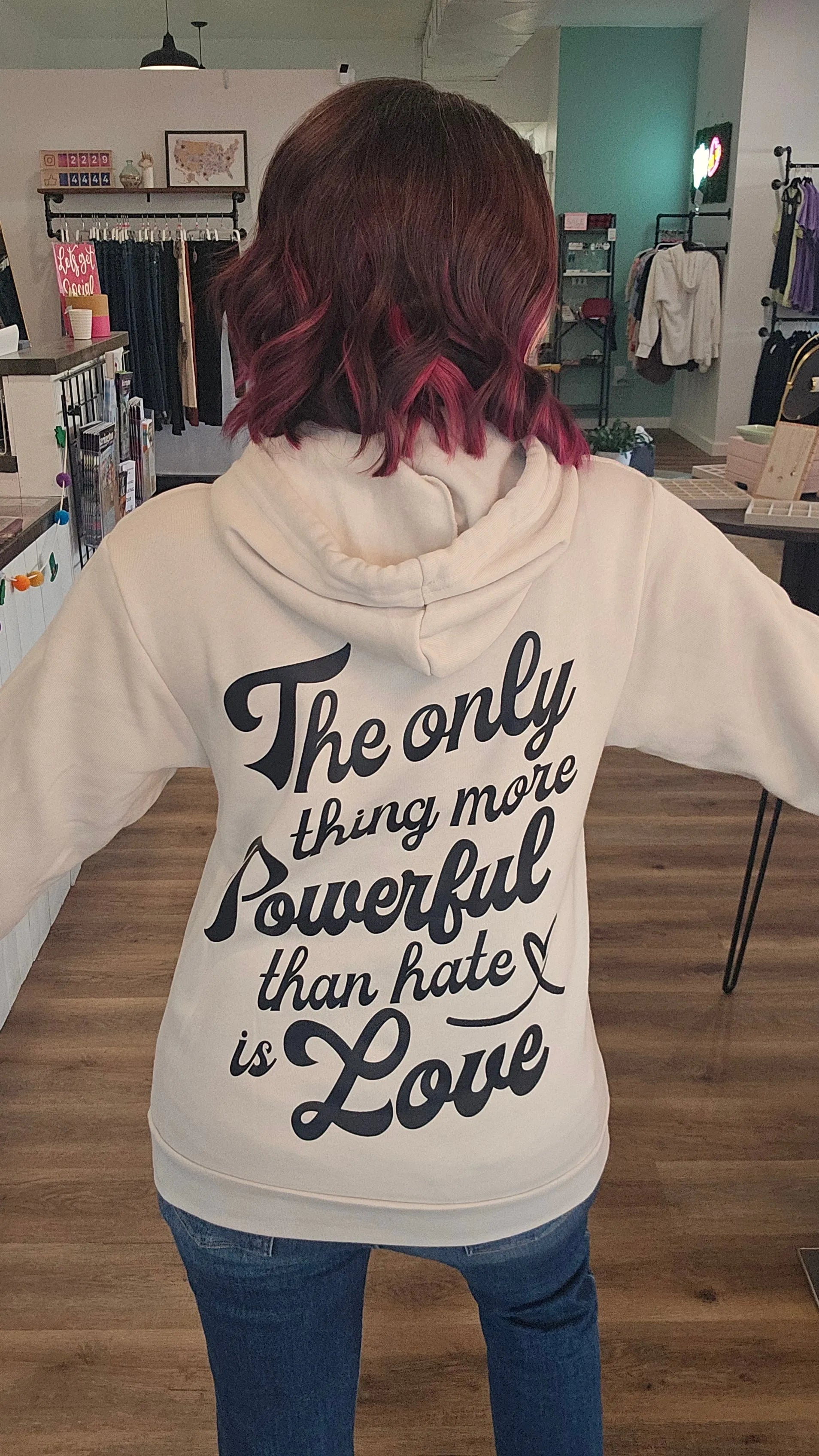 Shop The Only Thing More Powerful Than Hate is Love Back Print | Fundraiser-Hoodie at Ruby Joy Boutique, a Women's Clothing Store in Pickerington, Ohio