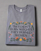 Shop They Didn't Burn Witches Custom Graphic - Floral- at Ruby Joy Boutique, a Women's Clothing Store in Pickerington, Ohio