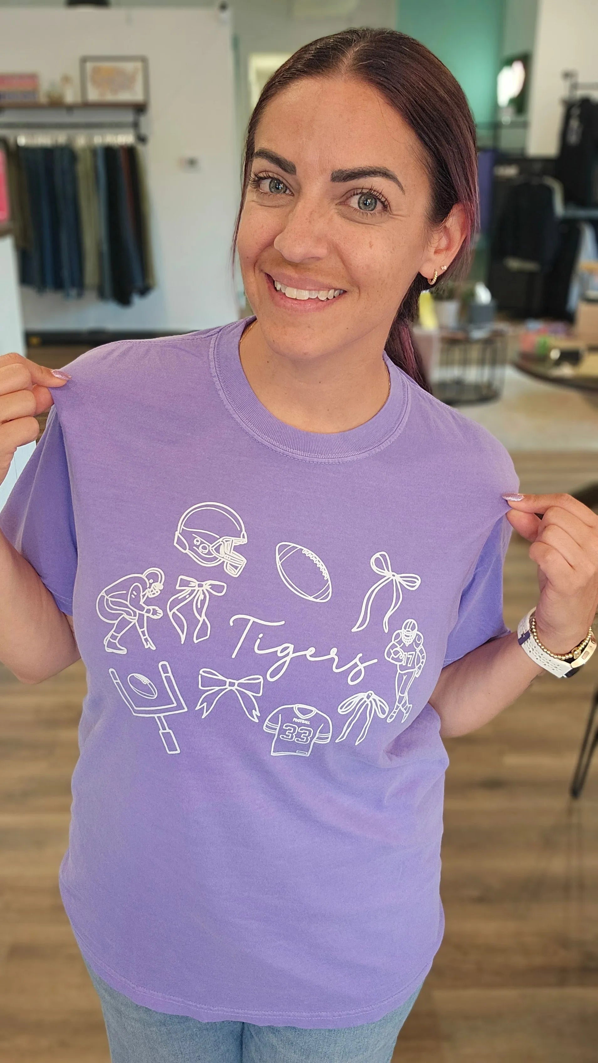 Shop Tigers Football Collage Graphic Tee- at Ruby Joy Boutique, a Women's Clothing Store in Pickerington, Ohio