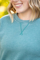 Shop Vintage Wash Pocket Pullover - Teal-clothing at Ruby Joy Boutique, a Women's Clothing Store in Pickerington, Ohio