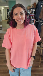 Shop Wavy Ribbed Short Sleeve Pocket Top - Coral-S/M at Ruby Joy Boutique, a Women's Clothing Store in Pickerington, Ohio