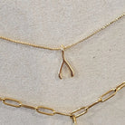 Shop Wishbone Charm- at Ruby Joy Boutique, a Women's Clothing Store in Pickerington, Ohio