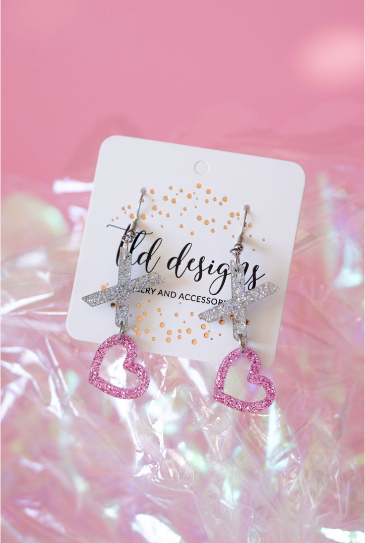 Shop XOXO Heart Glitter Dangle Earrings- at Ruby Joy Boutique, a Women's Clothing Store in Pickerington, Ohio