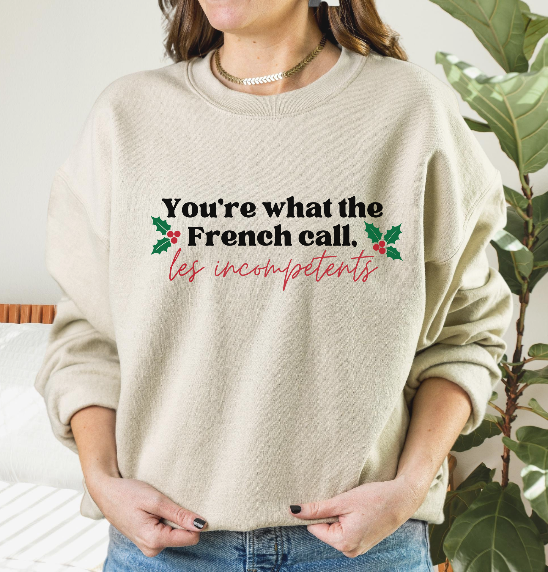 Shop You're What The French Call Les Incompétents Graphic Top | Home Alone Christmas- at Ruby Joy Boutique, a Women's Clothing Store in Pickerington, Ohio