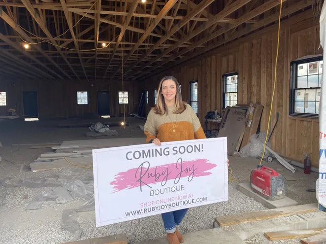 Danielle Resseguie shows off the space at 88 W. Church St., Suite 100 where her women's and children's clothing shop, Ruby Joy Boutique, is expected to open in March.