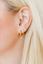 Shop Scarlett Huggie Hoop Earrings - 8mm- at Ruby Joy Boutique, a Women's Clothing Store in Pickerington, Ohio