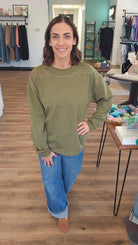 Shop Stud Shoulder Sweatshirt: Olive- at Ruby Joy Boutique, a Women's Clothing Store in Pickerington, Ohio