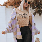 Shop Super Leftist Villain Classic Tee- at Ruby Joy Boutique, a Women's Clothing Store in Pickerington, Ohio